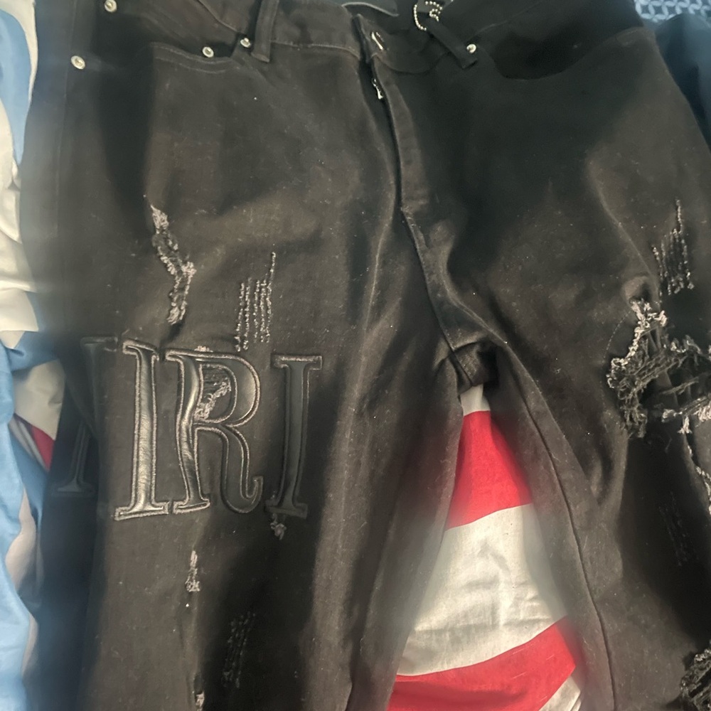 AMIRI Black Distressed Skinny Jeans